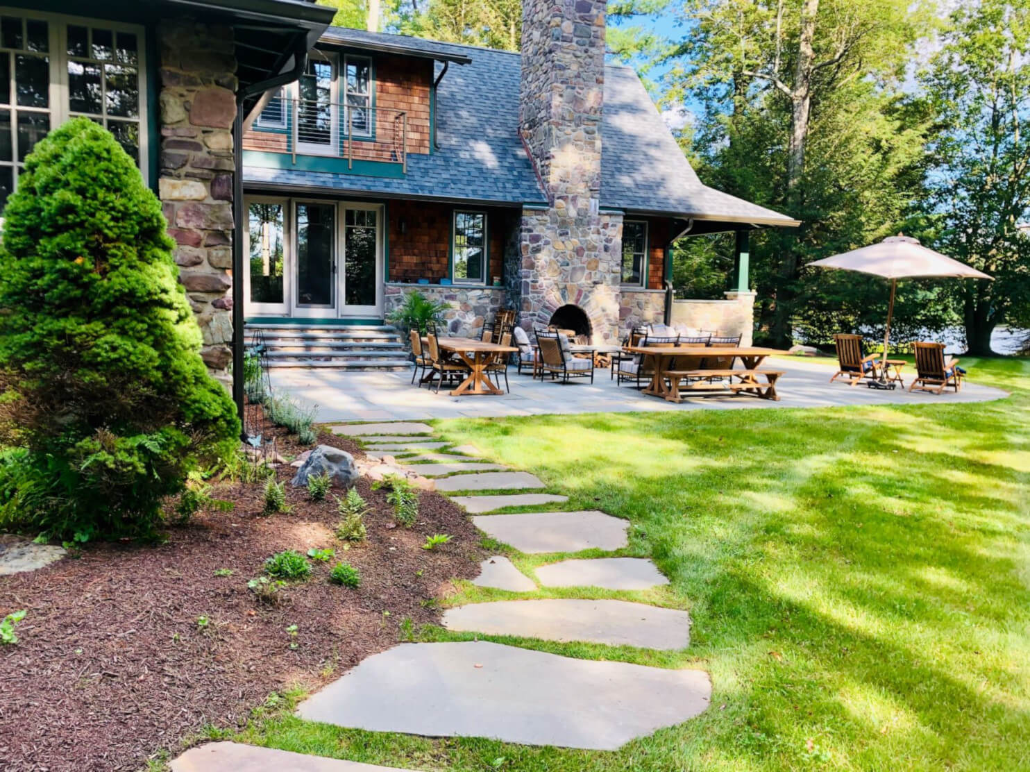Natural flagstone stepping stone walkway through garden