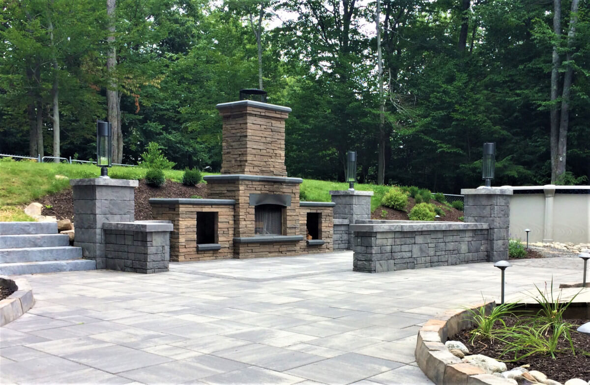 Custom water feature pond installation in Pocono Mountains yard